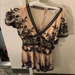 Lace floral nude/black romper